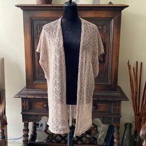 Light weight, loose cardigan with subtle sequin shimmer detail